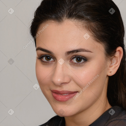 Joyful white young-adult female with medium  brown hair and brown eyes