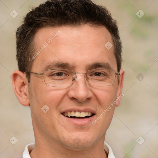 Joyful white adult male with short  brown hair and brown eyes