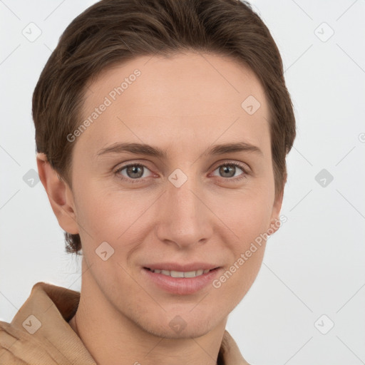 Joyful white young-adult female with short  brown hair and grey eyes