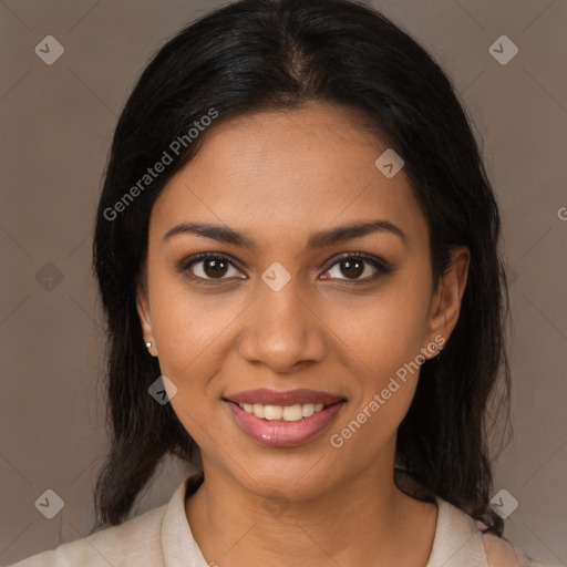 Joyful black young-adult female with medium  brown hair and brown eyes