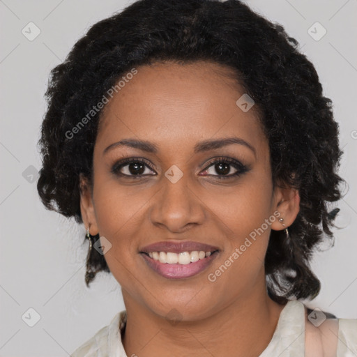 Joyful black young-adult female with medium  brown hair and brown eyes