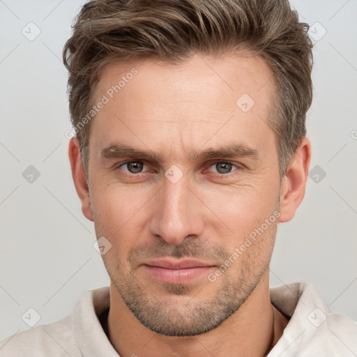 Neutral white adult male with short  brown hair and brown eyes