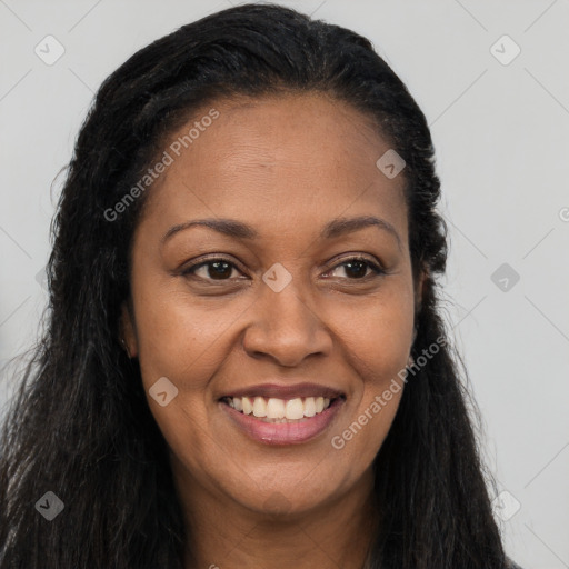 Joyful latino young-adult female with long  brown hair and brown eyes
