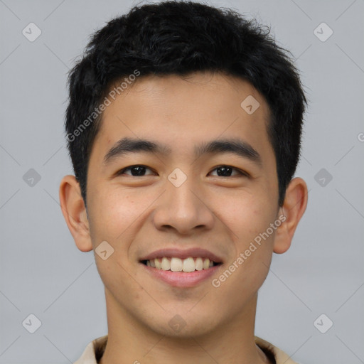 Joyful asian young-adult male with short  black hair and brown eyes