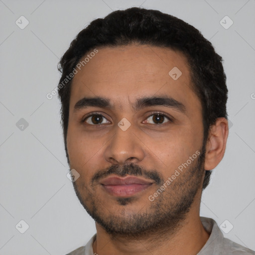 Neutral latino young-adult male with short  black hair and brown eyes