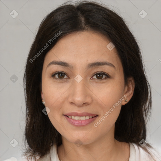 Joyful latino young-adult female with medium  brown hair and brown eyes