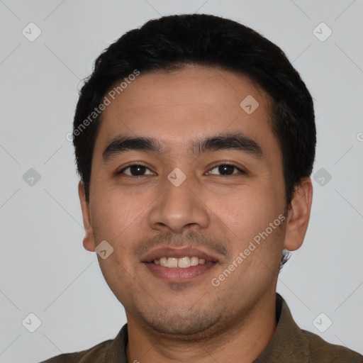 Joyful latino young-adult male with short  black hair and brown eyes