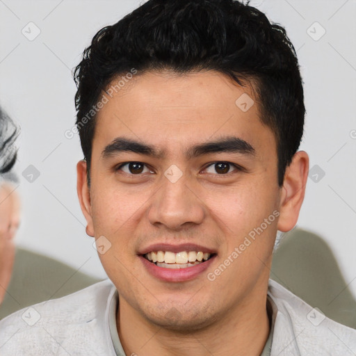 Joyful latino young-adult male with short  brown hair and brown eyes