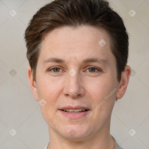 Joyful white adult female with short  brown hair and brown eyes