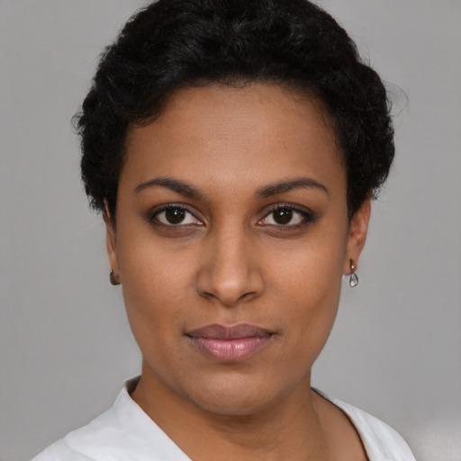 Neutral black young-adult female with short  black hair and brown eyes