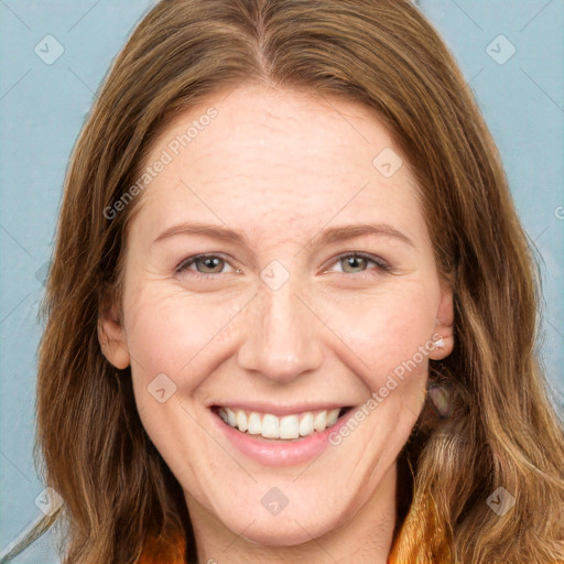 Joyful white adult female with long  brown hair and brown eyes