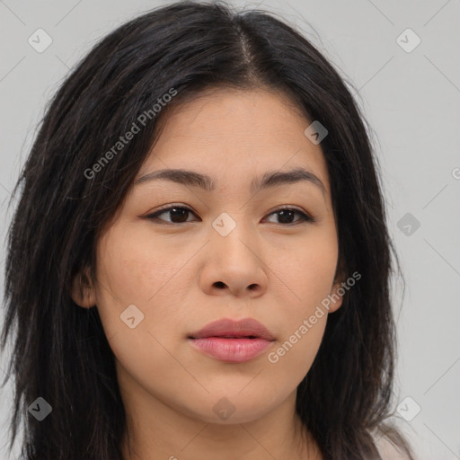 Joyful asian young-adult female with long  brown hair and brown eyes