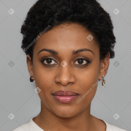 Joyful black young-adult female with short  black hair and brown eyes