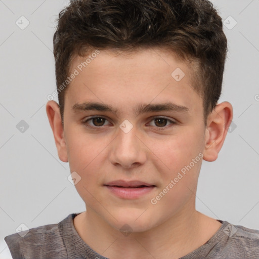 Joyful white child male with short  brown hair and brown eyes