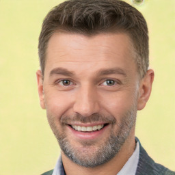 Joyful white young-adult male with short  brown hair and brown eyes