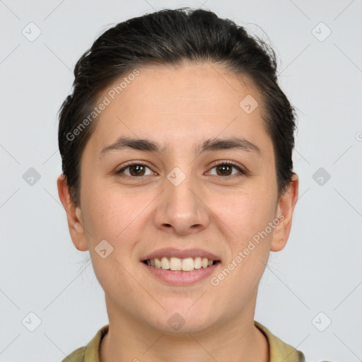 Joyful white young-adult female with short  brown hair and brown eyes