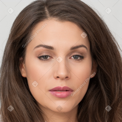 Neutral white young-adult female with long  brown hair and brown eyes