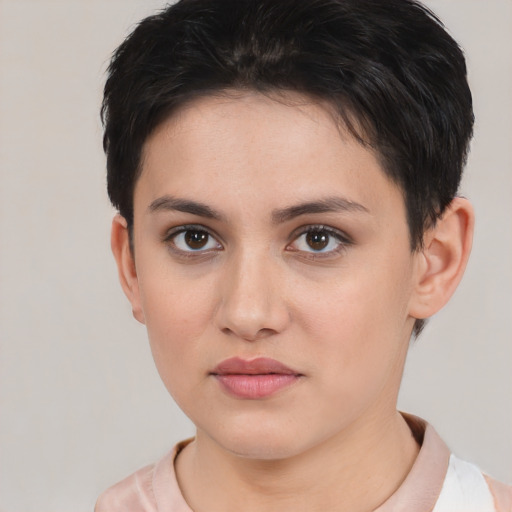 Neutral white young-adult female with short  brown hair and brown eyes