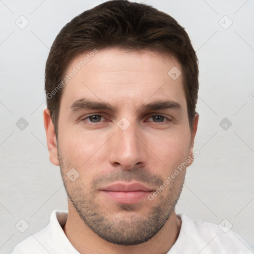 Neutral white young-adult male with short  brown hair and brown eyes