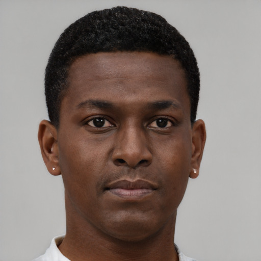Neutral black young-adult male with short  brown hair and brown eyes