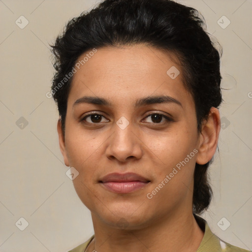 Joyful latino young-adult female with short  brown hair and brown eyes