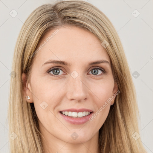 Joyful white young-adult female with long  brown hair and green eyes