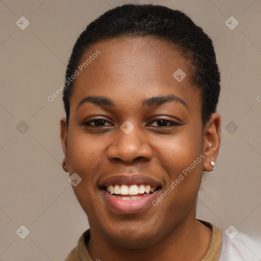 Joyful black young-adult female with short  brown hair and brown eyes