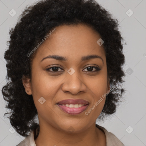 Joyful black young-adult female with long  brown hair and brown eyes