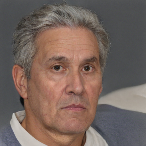 Neutral white middle-aged male with short  gray hair and brown eyes