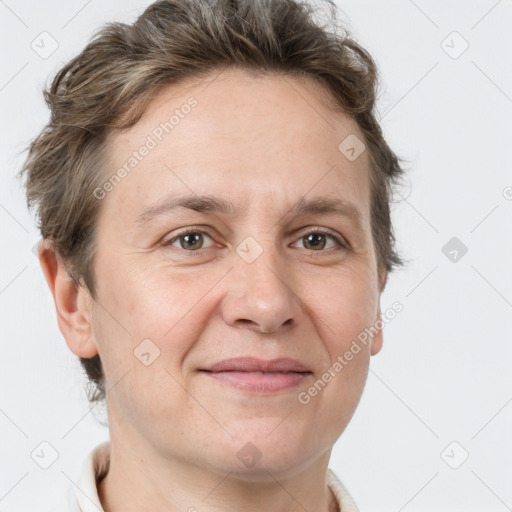 Joyful white adult male with short  brown hair and grey eyes