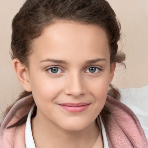 Joyful white child female with medium  brown hair and grey eyes