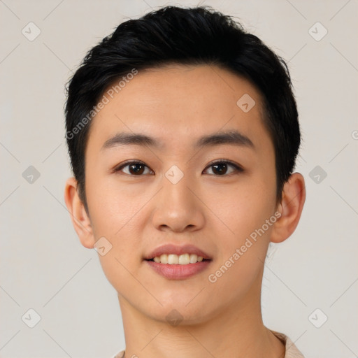 Joyful asian young-adult male with short  black hair and brown eyes