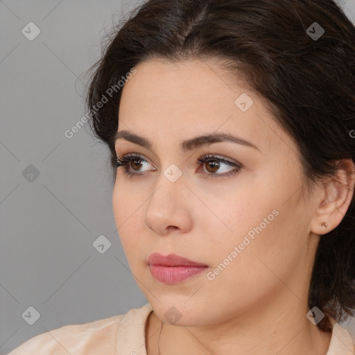 Neutral white young-adult female with medium  brown hair and brown eyes