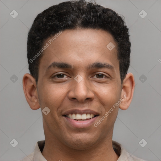 Joyful latino young-adult male with short  brown hair and brown eyes