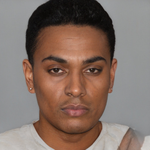 Neutral latino young-adult male with short  black hair and brown eyes