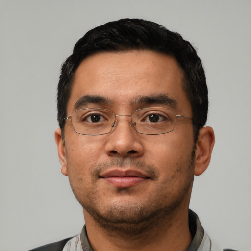 Neutral asian adult male with short  black hair and brown eyes