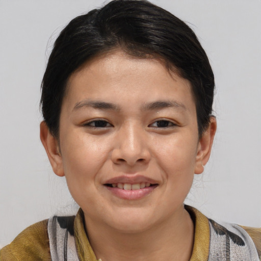 Joyful asian young-adult female with short  brown hair and brown eyes