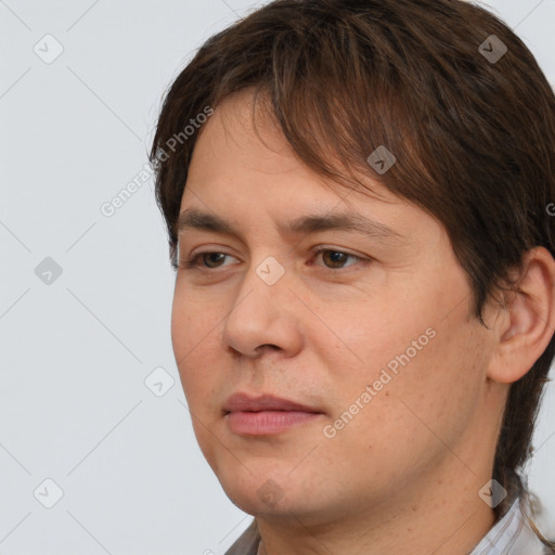 Neutral white young-adult male with medium  brown hair and brown eyes