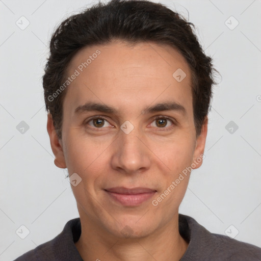 Joyful white adult male with short  brown hair and brown eyes