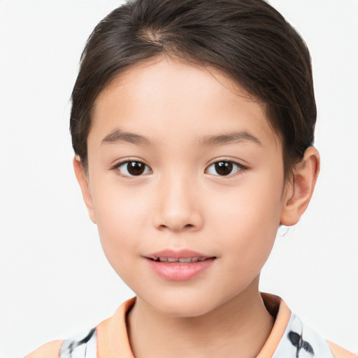 Joyful white child female with short  brown hair and brown eyes