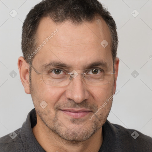 Joyful white adult male with short  brown hair and brown eyes