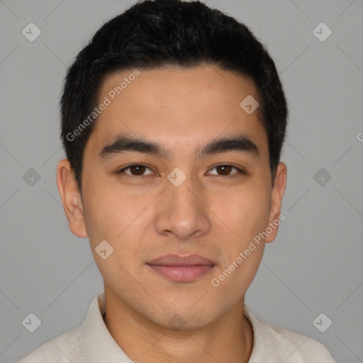 Joyful latino young-adult male with short  brown hair and brown eyes