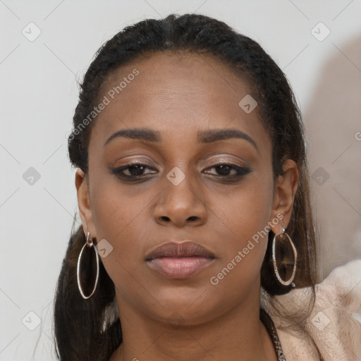 Neutral black young-adult female with long  brown hair and brown eyes