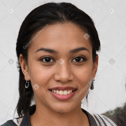 Joyful latino young-adult female with medium  brown hair and brown eyes