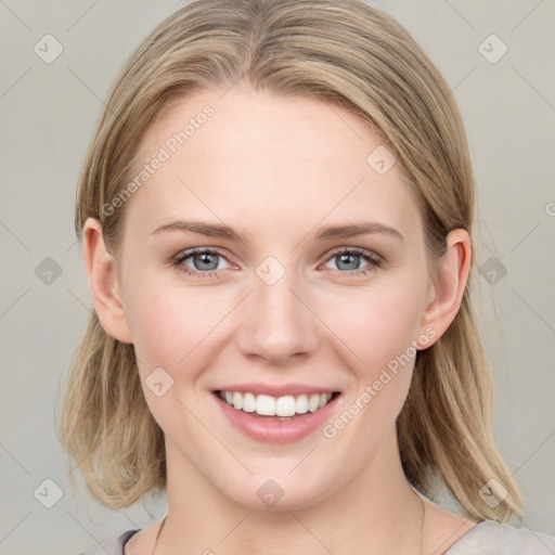 Joyful white young-adult female with medium  brown hair and blue eyes