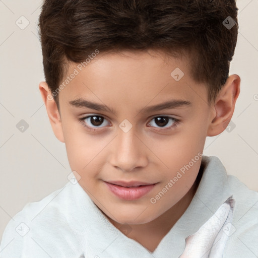 Joyful white child male with short  brown hair and brown eyes