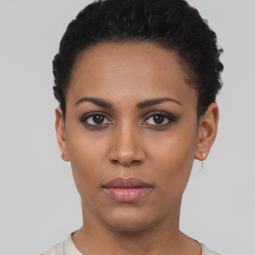 Neutral black young-adult female with short  black hair and brown eyes