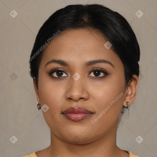 Joyful latino young-adult female with medium  black hair and brown eyes