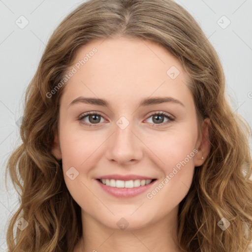 Joyful white young-adult female with long  brown hair and green eyes