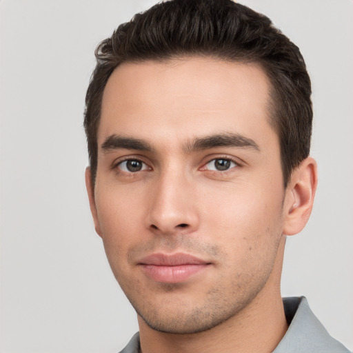 Neutral white young-adult male with short  brown hair and brown eyes